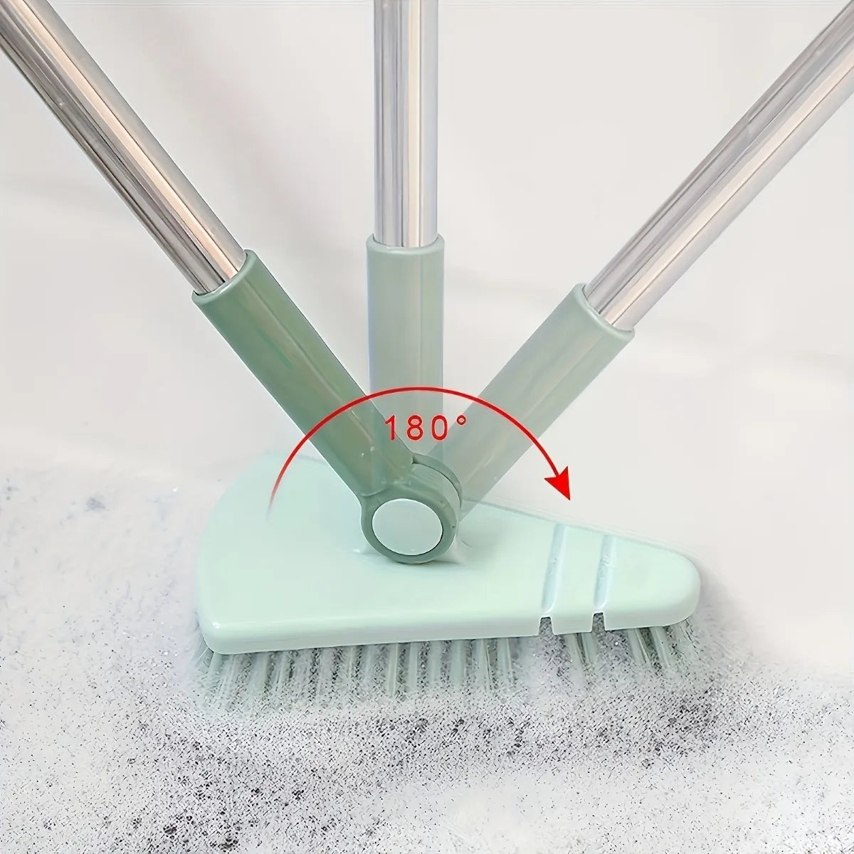 Brosse à manche télescopique pour le ménage
