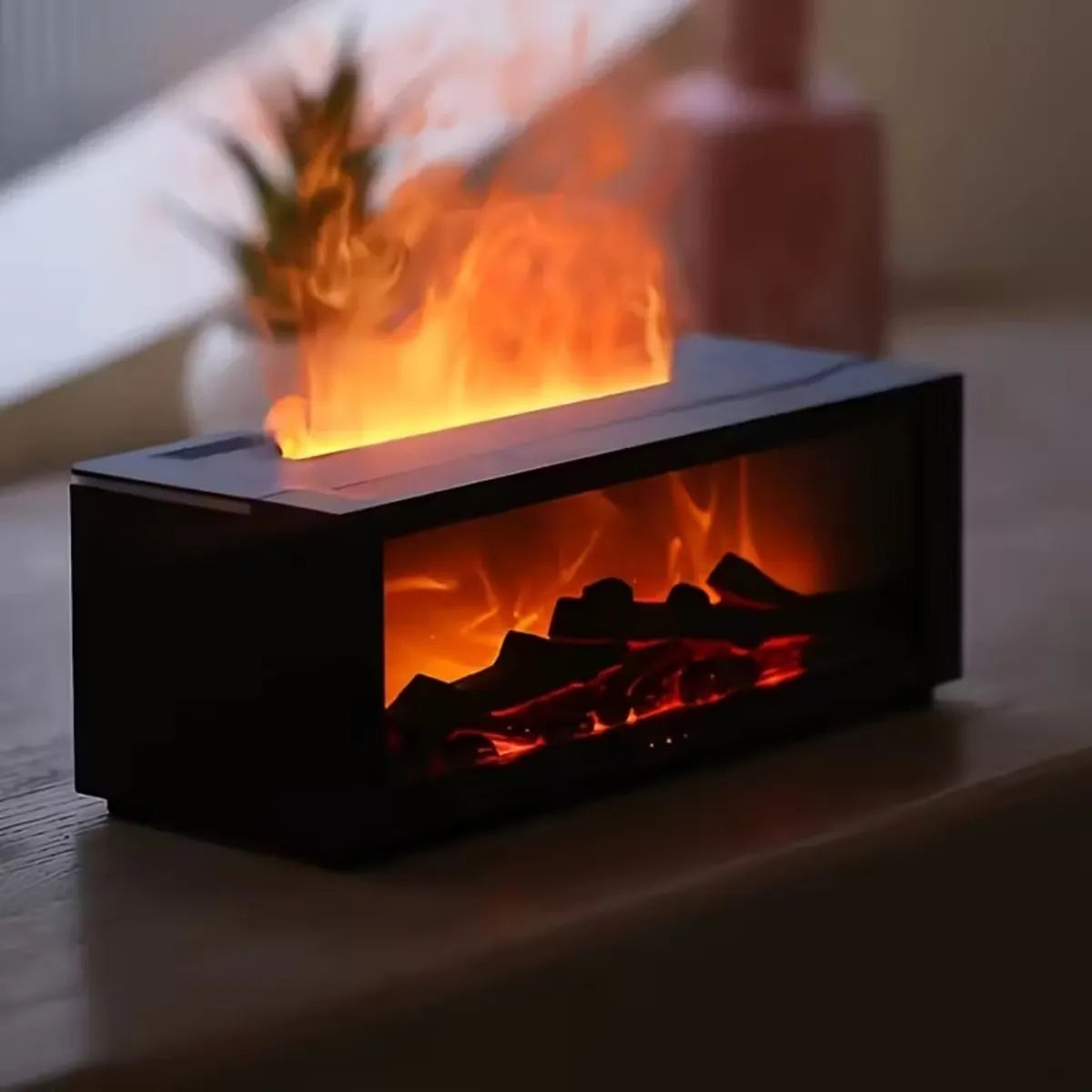 Diffuseur d’aromathérapie Nidora avec vapeur simulant une flamme et parfum relaxant.