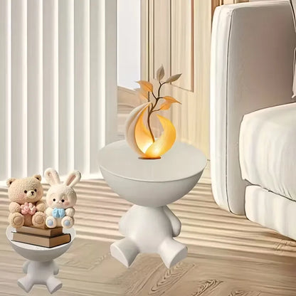 Table d’appoint Nidora en forme d’ours servant d’élément décoratif original et fonctionnel.