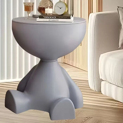 Table d’appoint ours Nidora dans un salon moderne, parfaite pour compléter une déco design et pratique.