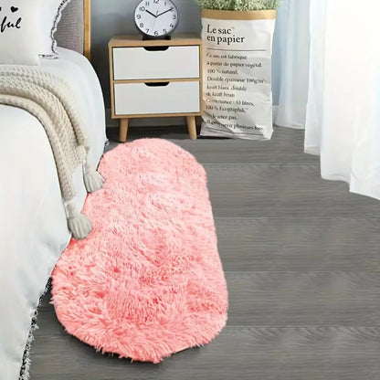 Tapis rose moelleux Nidora pour une ambiance cocooning.